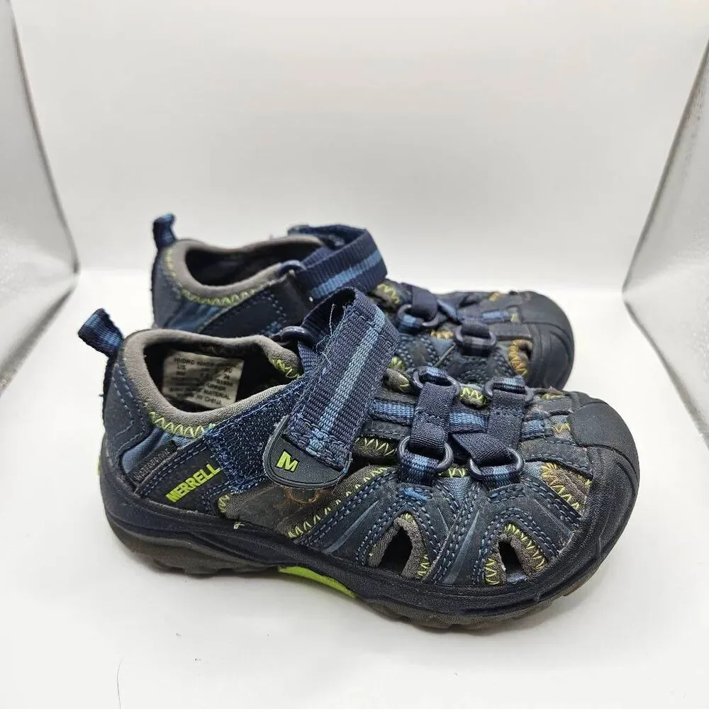 Merrell Hydro Hiker Kids Sandals  in a navy blue and lime green colorway, featur